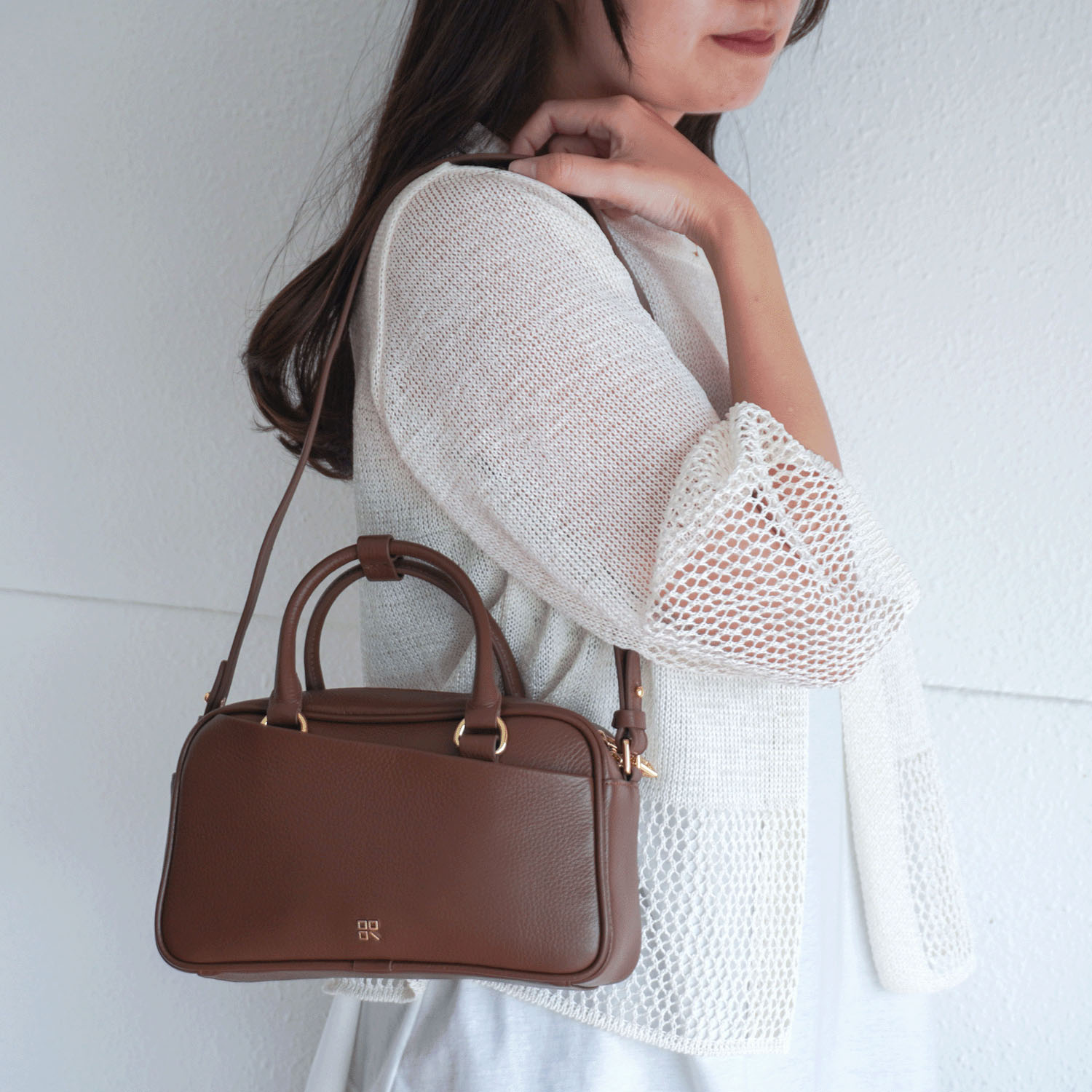 story．バイアスポケットハンドバッグ