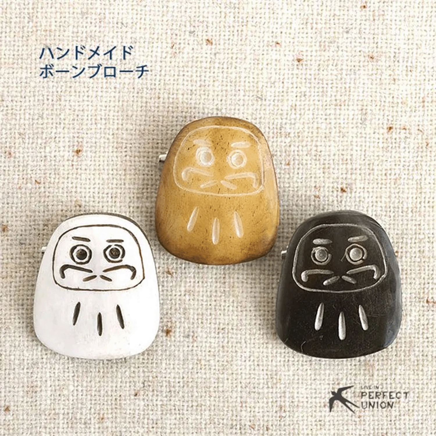 Boneブローチ だるま